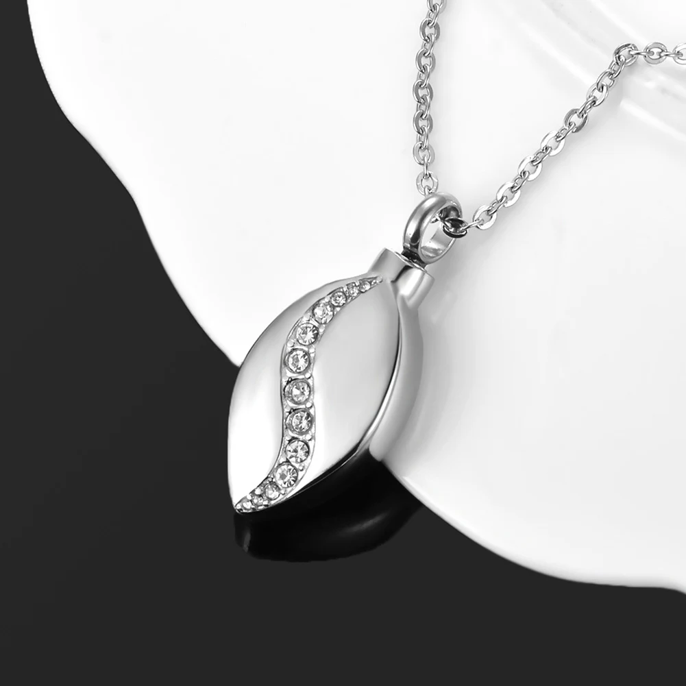 Colar com pingente de frasco de perfume minimalista em aço inoxidável com gotas de água e diamante. Elegância e sofisticação. — foto 3