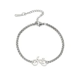 Pulseira de aço inoxidável com pingente de bicicleta pequena, vazada e personalidade. Aço titânio simples e corte especial. Perfeita para ciclistas. — foto 1