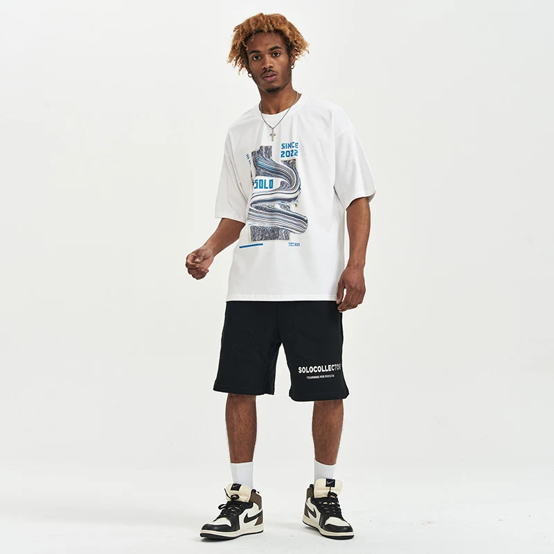 Camisetas soltas de manga curta com estampa digital para homens e mulheres. Conforto e estilo para o dia a dia, perfeitas para looks casuais. — foto 4