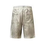 Pantaloncini tie-dye stile vintage, colori a contrasto e lavaggio. Perfetti per l'estate, comodi e ideali per un look casual. — foto 4