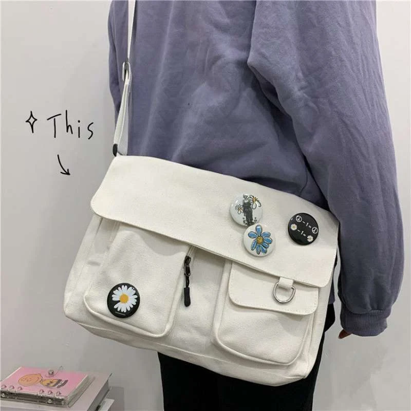 Bolsa grande de um ombro com margaridas, design charmoso e alta capacidade para carregar tudo que você precisa com praticidade. — foto 6
