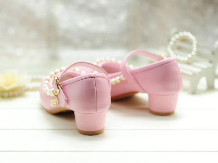 Title 5, High-heeled single shoes featuring a princess s...