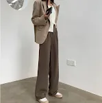Calças casuais femininas de cintura alta com pernas retas verticais. Conforto e elegância para o seu dia a dia. — foto 3