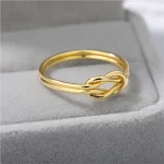 Anéis femininos com design de cruz e zircônias. Aço inoxidável. Elegância e brilho. Joia perfeita para um visual sofisticado e moderno. — foto 8