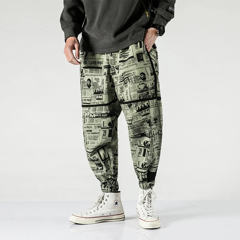 Tide brand hip hop newspaper pants men and women pants ins the same paragraph street loose beam pants national tide — photo 5