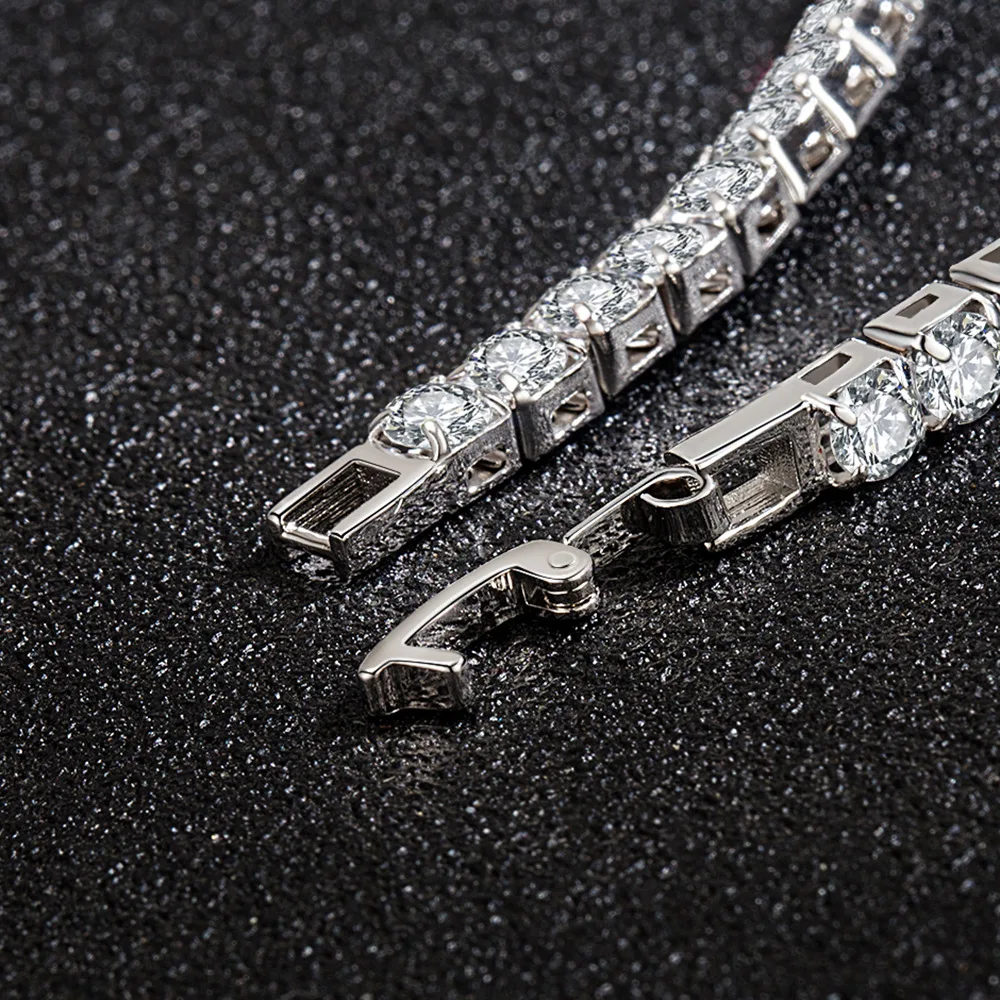 Eenvoudige armband met twee rijen van drie fonkelende zirkonen, een subtiele glans voor elke outfit — foto 1