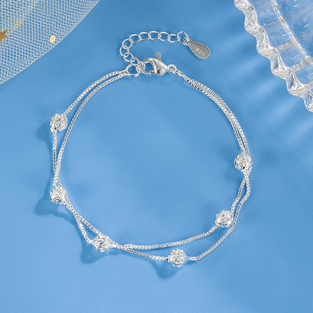 Pulseira feminina de bolas vazadas dupla camada Design Fashion Charmosa e elegante, adicione um toque de sofisticação ao seu visual com esta pulseira. — foto 1