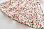 Vestido floral para menina com mangas esvoaçantes e lapela, ideal para um visual elegante e com personalidade. Perfeito para ocasiões especiais. — foto 7