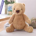 Urso de pelúcia marrom de 30cm. Perfeito para abraçar, brincar e decorar quartos infantis. Macio e fofo, um amigo inseparável para crianças. — foto 4