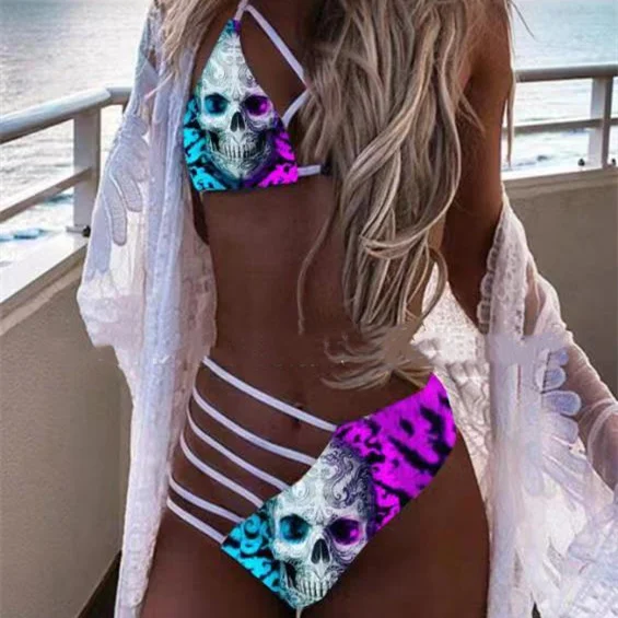 Multicolor skull print split tie swimsuit available in multiple sizes. Get a unique beach look with this stylish and com — photo 1