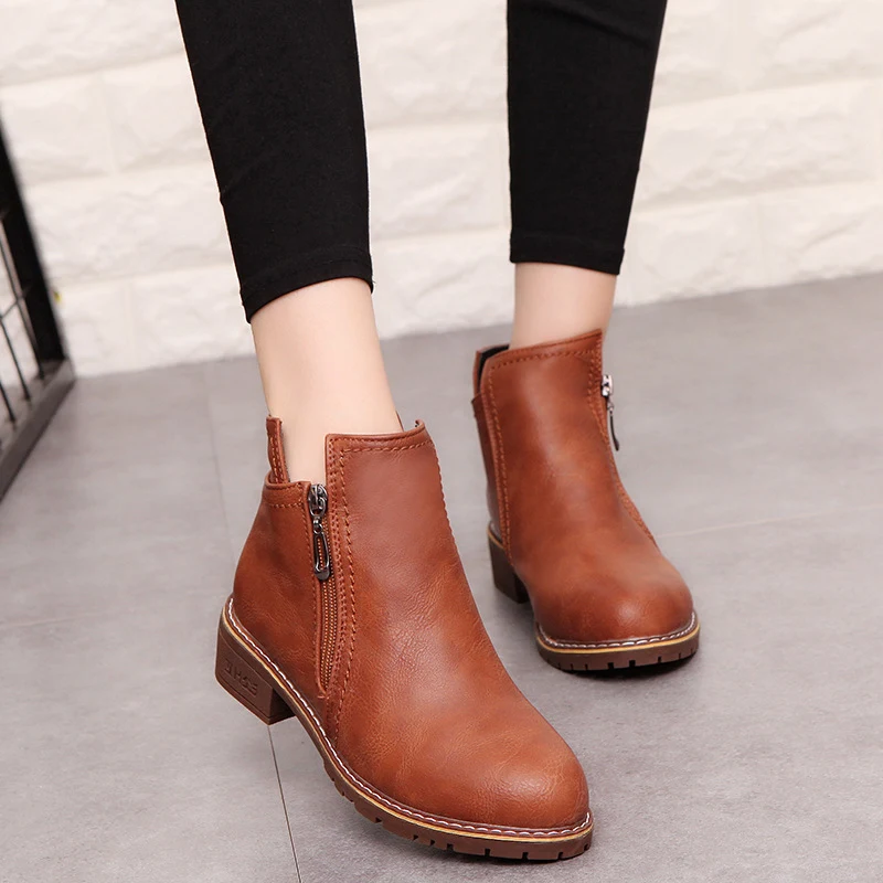 Women's boots with a thick heel and side zipper, designed for comfort and style. Easy to wear and perfect for any occasi — photo 5