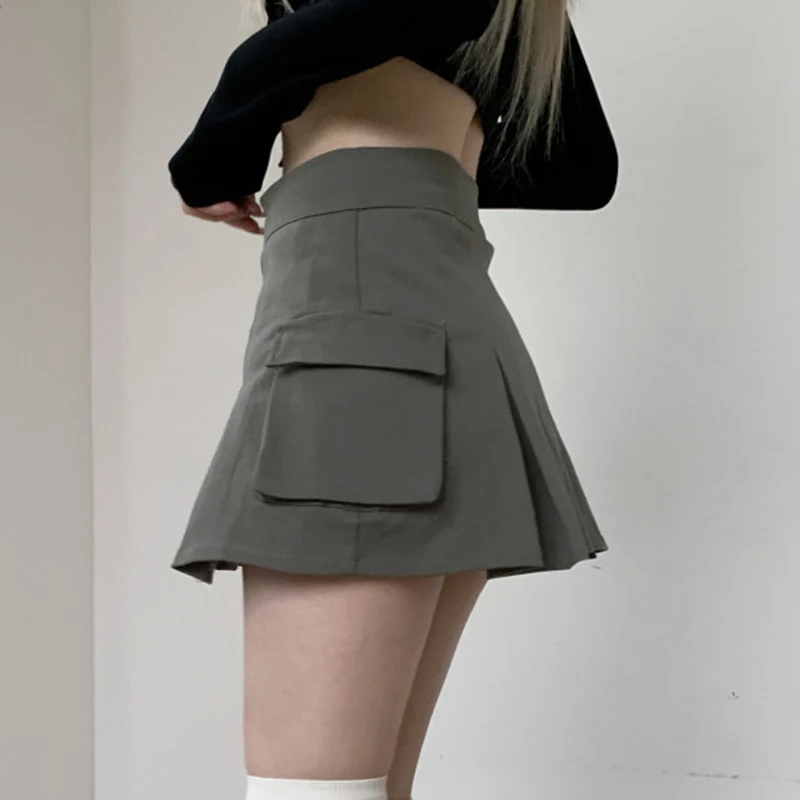 Falda de trabajo plisada de tiro bajo estilo punk para mujer, versátil y moderna, ideal para un look audaz y único. — foto 1