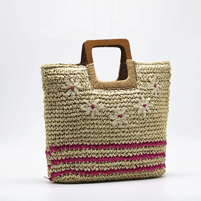Bolsa de mão com bordado floral e grama tecida, um acessório elegante e prático para carregar seus itens essenciais com estilo e charme, perfeita para o dia a dia. — foto 5