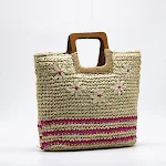 Bolsa de mão com bordado floral e grama tecida, um acessório elegante e prático para carregar seus itens essenciais com estilo e charme, perfeita para o dia a dia. — foto 5
