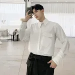 White shirt with diagonal pockets, a stylish essential. Experience comfort and versatility. Perfect for a modern, sophis — photo 4