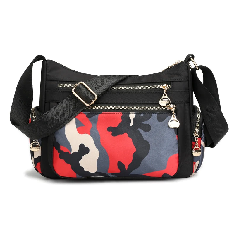 Bolsa feminina étnica de nylon estampada, transversal de ombro, ideal para um visual estiloso e prático no dia a dia. — foto 2