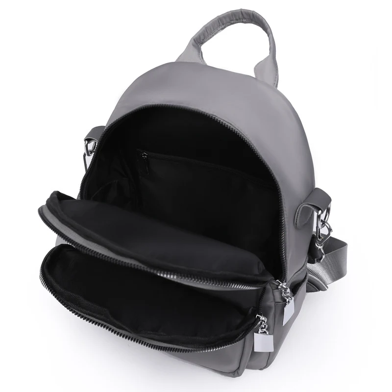 Nova Mochila Feminina em Nylon Oxford, Fashion, Simples e Casual, Perfeita para o Dia a Dia e com Design Moderno e Versátil. — foto 1