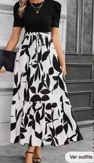 Exotisches Urlaubs-Kleid mit floralem Print, Rundhalsausschnitt, elegant und stilvoll. Ideal für sonnige Tage und besondere Anlässe. — foto 3
