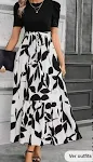 Exotisches Urlaubs-Kleid mit floralem Print, Rundhalsausschnitt, elegant und stilvoll. Ideal für sonnige Tage und besondere Anlässe. — foto 3