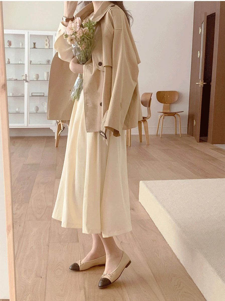 Vestido plissado de manga longa com cintura marcada, perfeito para um visual elegante e sofisticado. Destaque sua silhueta com estilo. — foto 3