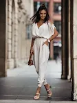 Women's V-neck pocket jumpsuit with elastic waist. Casual pants offering comfort and style for everyday wear and relaxed — photo 8