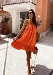 Vestido solto com babados, decote em V e costas abertas, ideal para o verão, confortável e elegante para diversas ocasiões. — foto 1