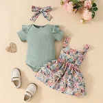 Conjunto para recém-nascidos com romper triangular de manga curta e saia com suspensórios, perfeito para conforto e estilo do bebê. — foto 3