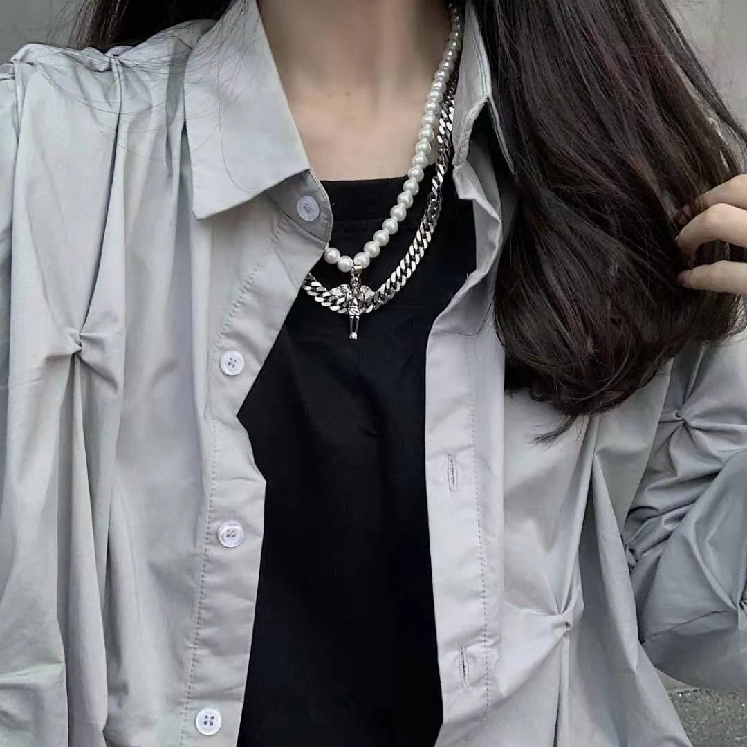 Corrente Pearl Little Angel com costura dupla para maior segurança. Ideal para prender com estilo, elegante e durável. — foto 1