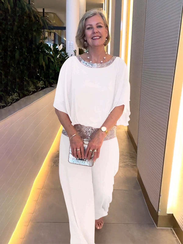 Camisa com lantejoulas e gola redonda combinando com cores batwing, calças largas, terno feminino — foto 1