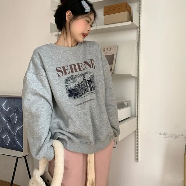 Blusa Feminina Estilo Coreano Soltinha e Emagrecedora, perfeita para um visual casual e moderno. Conforto e elegância em uma só peça. — foto 1