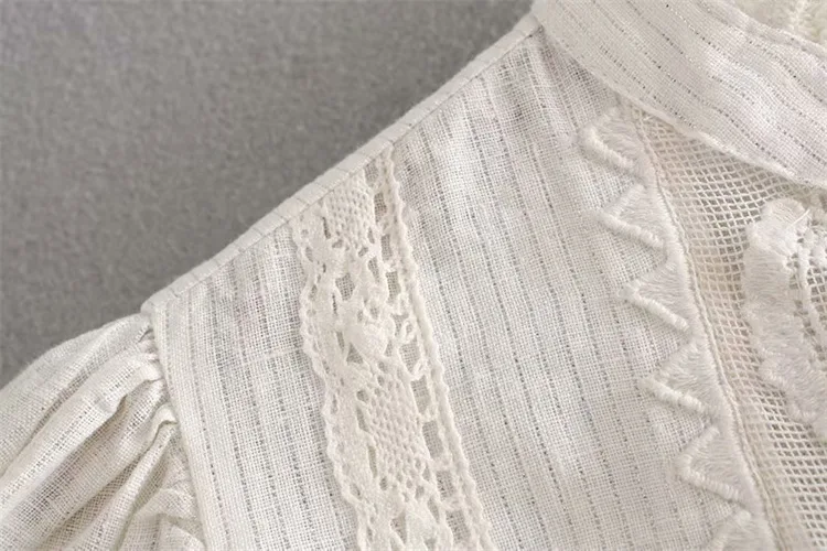 Title 8, Lace Embroidered Bubble Sleeved Loose Top. Effo...