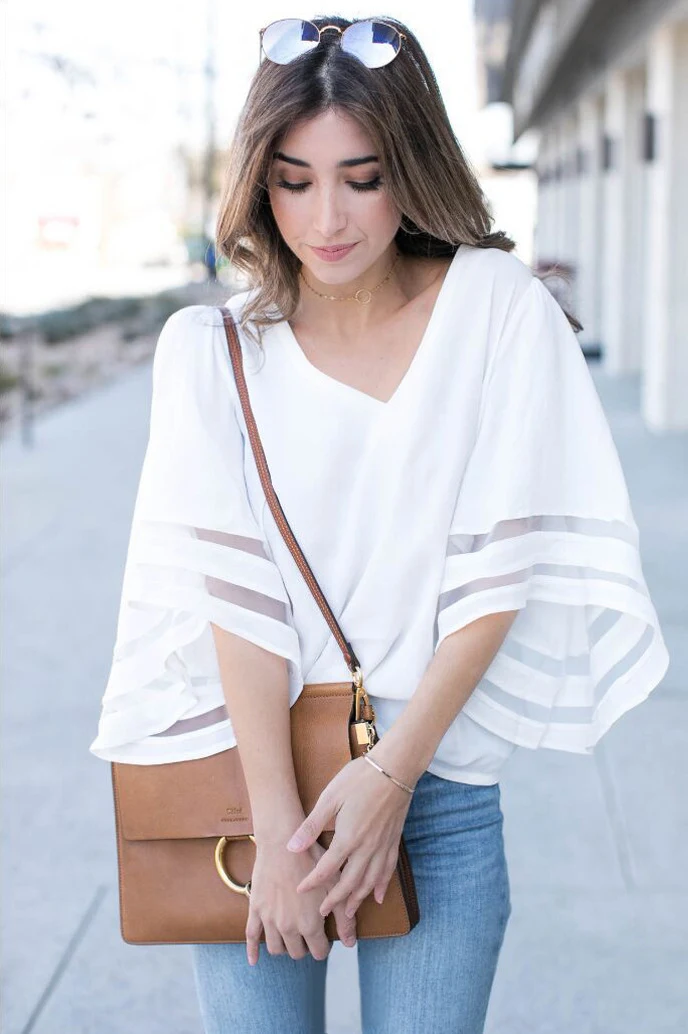 Blusa donna in chiffon con scollo a V Top leggero e arioso per l'estate Perfetta per look casual ed eleganti Tessuto morbido e confortevole Stile versatile e femminile — foto 4