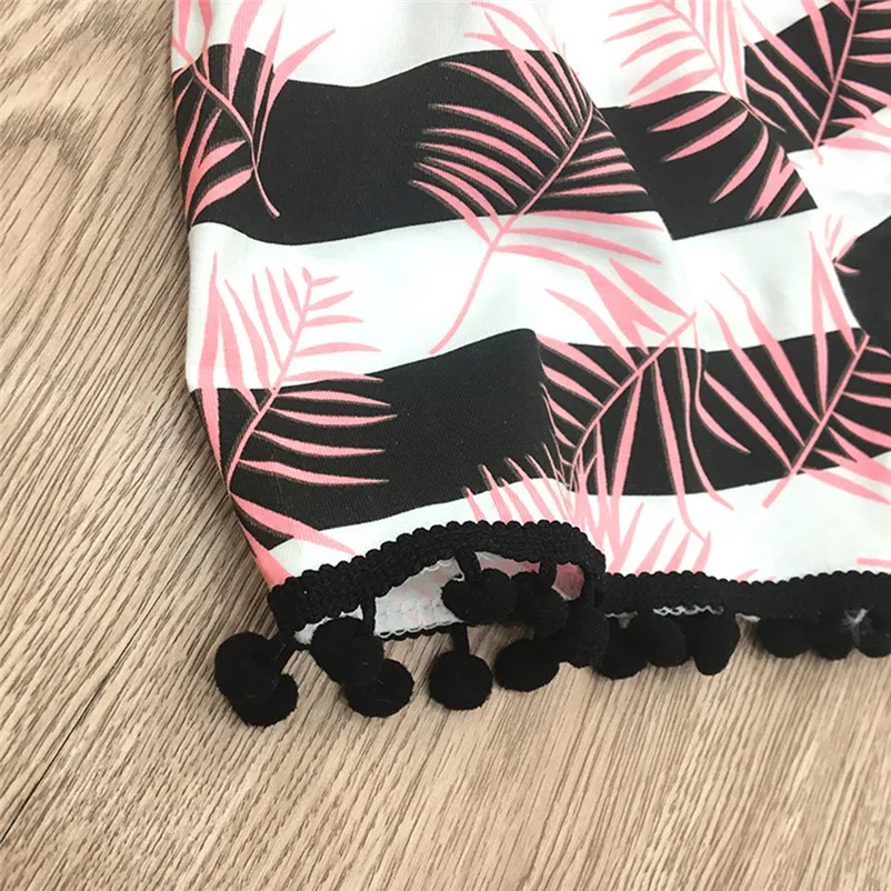 Terno de calça com franjas de bolinhas de coco listradas, elegante e confortável. Perfeito para um look casual e moderno. — foto 5