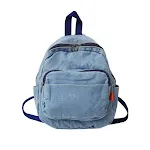 Mochila feminina de lona jeans lavada, perfeita para uso diário e viagens. Confortável, espaçosa e resistente, ideal para transportar seus pertences. — foto 1