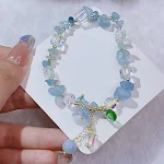 Pulseira Super Fada Cristal de Fluorita Roxa, Flor e Seixos Esmaltados em Aquamarine, elegância e espiritualidade em suas mãos. — foto 22
