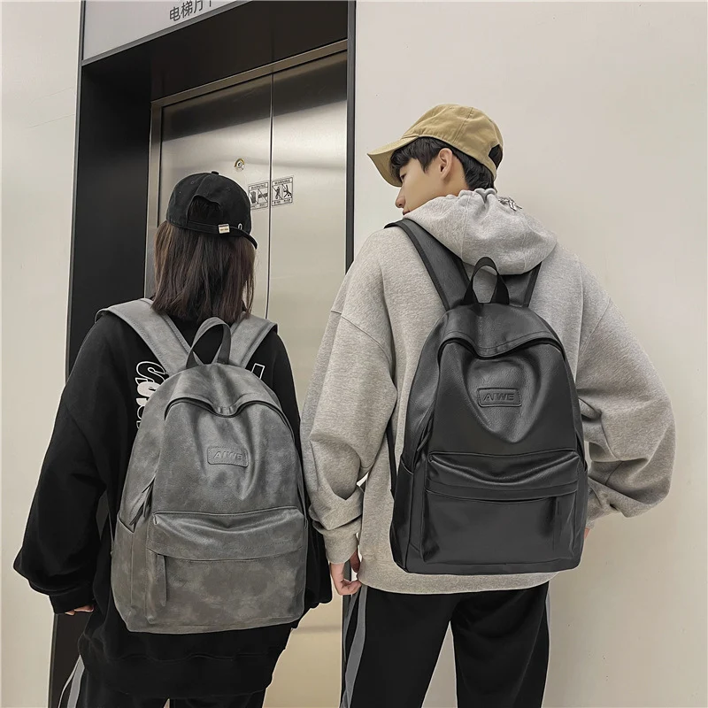 Mochila estudantil de cor sólida e grande capacidade. Ideal para estudantes, oferece espaço amplo e design prático para livros e materiais. — foto 3