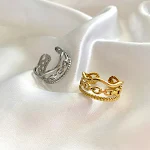 Eenvoudige ring van titanium staal met 18K goud, golvende ronde kralen met drie lagen, voor een unieke en stijlvolle look. — foto 4