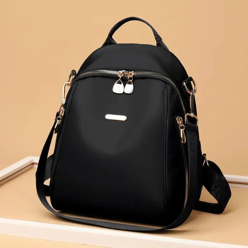 Mochila Oxford feminina casual fashion para viagem, perfeita para o dia a dia e aventuras, design elegante e funcional, leve e resistente, tecido Oxford. — foto 7