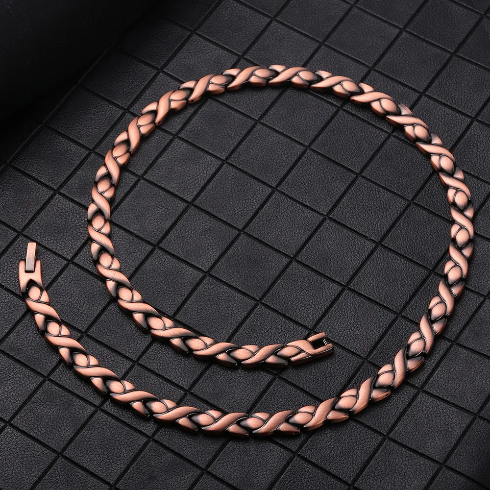 Colar masculino de cobre vermelho com imã, pingente de peixe pequeno e design simples. Perfeito para um visual moderno. — foto 4