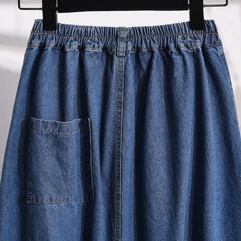Title 5, Saia jeans cintura alta plus size feminina. Com...