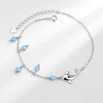 Pulseira de amor com golfinhos em prata esterlina. Demonstre seu carinho com esta elegante pulseira, um presente perfeito para qualquer ocasião especial. — foto 4
