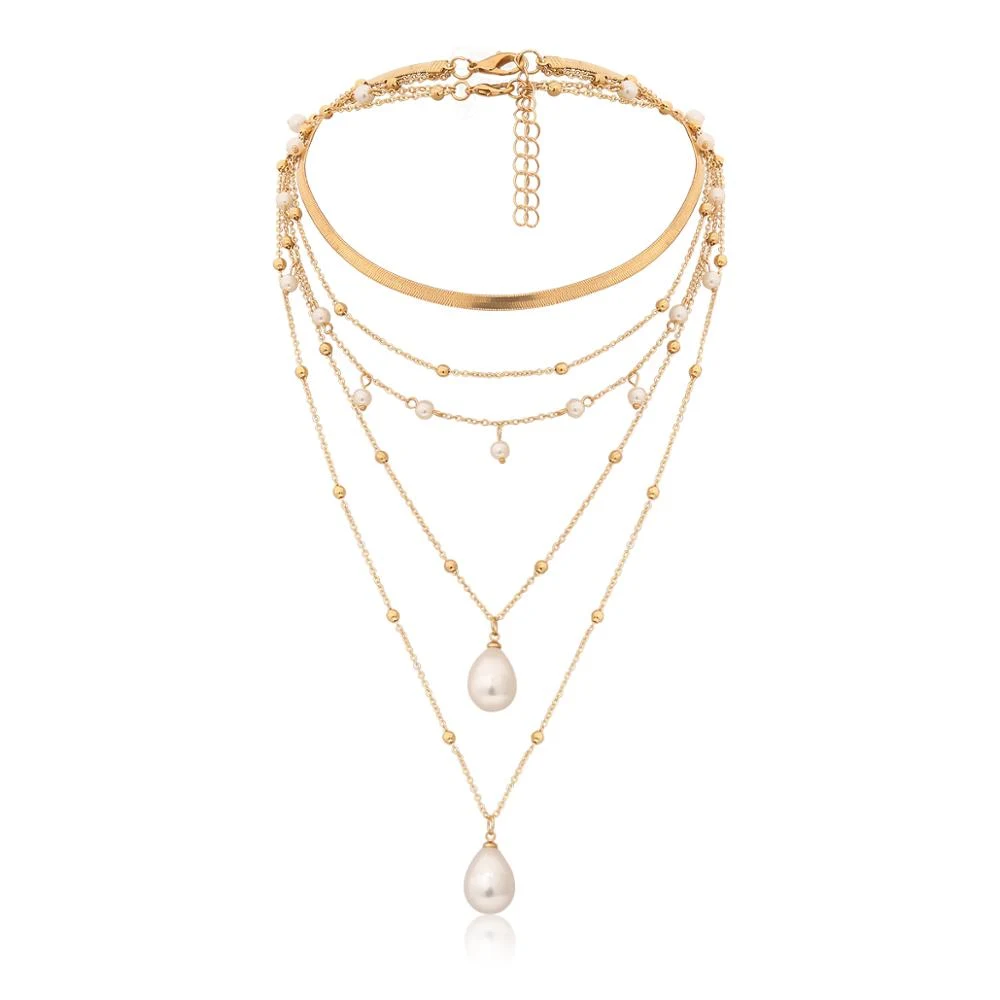 Colar de pérolas multi-elemento para um toque de sofisticação. Ideal para elevar seu estilo e adicionar elegância a qualquer look, realçando sua beleza. — foto 4