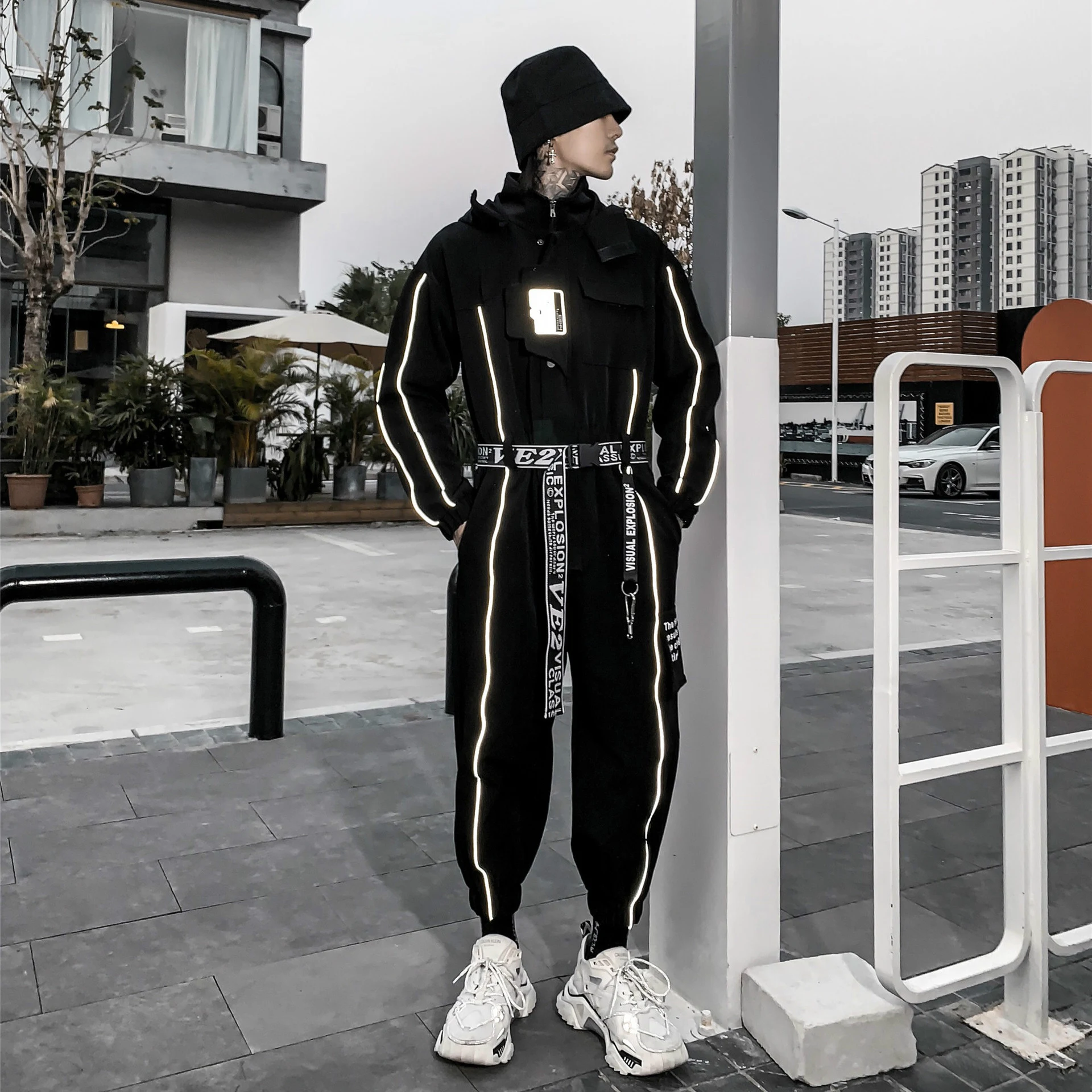 Title 3, Long-sleeved hooded suit with reflective tape. ...