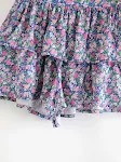 Falda estampada en capas para mujer, ideal para un look elegante y cómodo. Perfecta para diversas ocasiones, diseño versátil y moderno. — foto 1