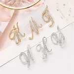 26 Spille Alfabeto Inglese con Diamanti Brilla con queste lettere scintillanti. Perfette per personalizzare il tuo stile e per un regalo speciale ed elegante. — foto 1