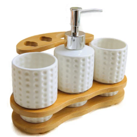 Complete bathroom accessories set with soap dispenser, tumbler, soap dish, and toilet brush, adding style and organizati — photo 3