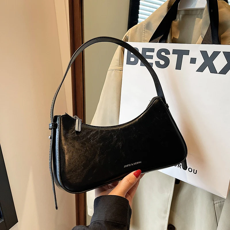 Bolsa de ombro de couro de cor sólida, ideal para uso diário. Durável, elegante e com espaço para seus itens essenciais. — foto 9