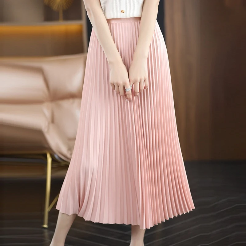 Geplooide midirok met hoge taille, losse pasvorm en dunne stof. Modieus en veelzijdig, voor elke outfit geschikt. — foto 10