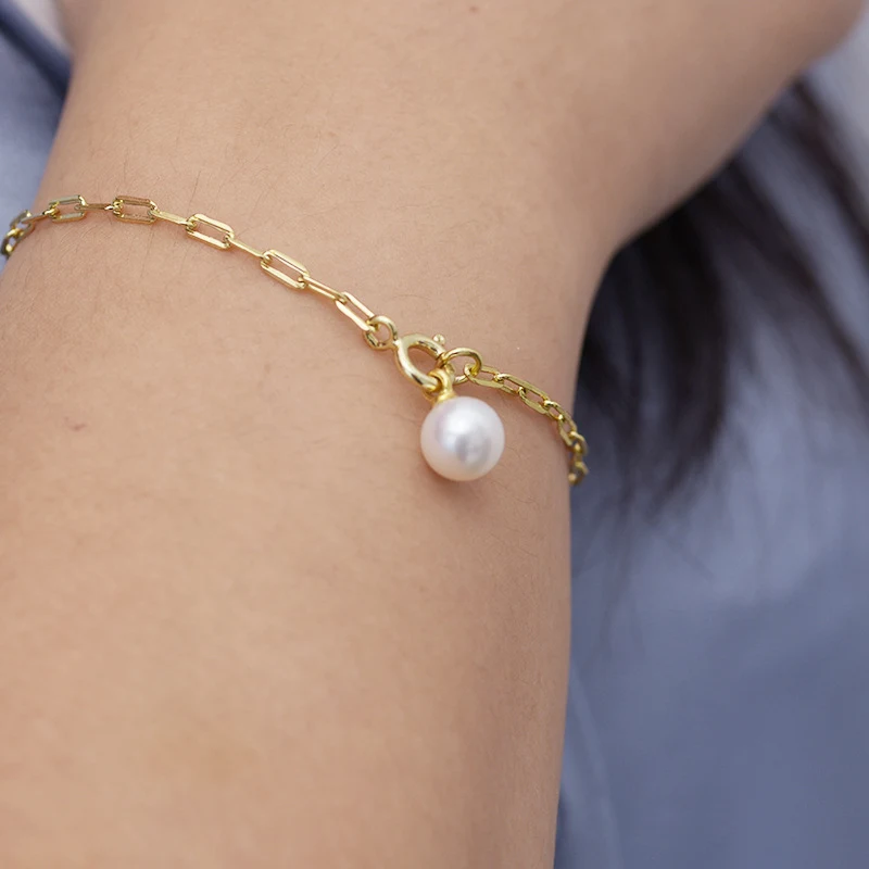 Armband met witte zoetwaterparels 8-9mm, sterke glans, bijna perfect, tijdloos sieraad voor elke outfit. — foto 10