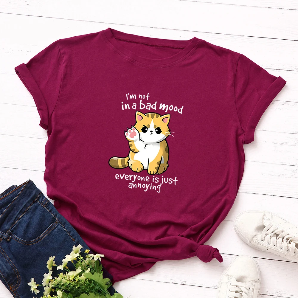 Camiseta feminina solta de algodão com gola redonda e manga curta — foto 2